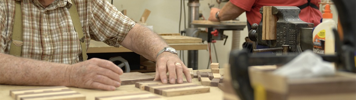 People working in wood shop image