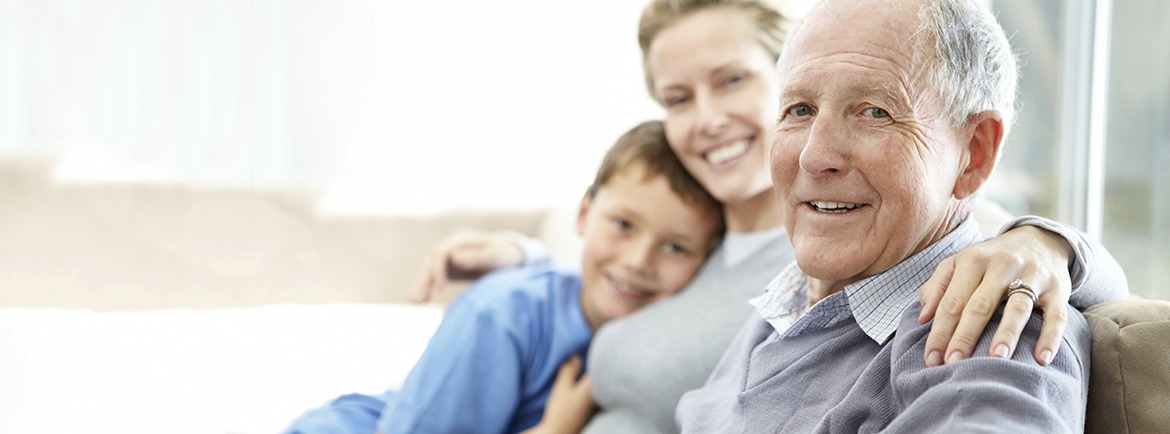 Family sitting on a couch